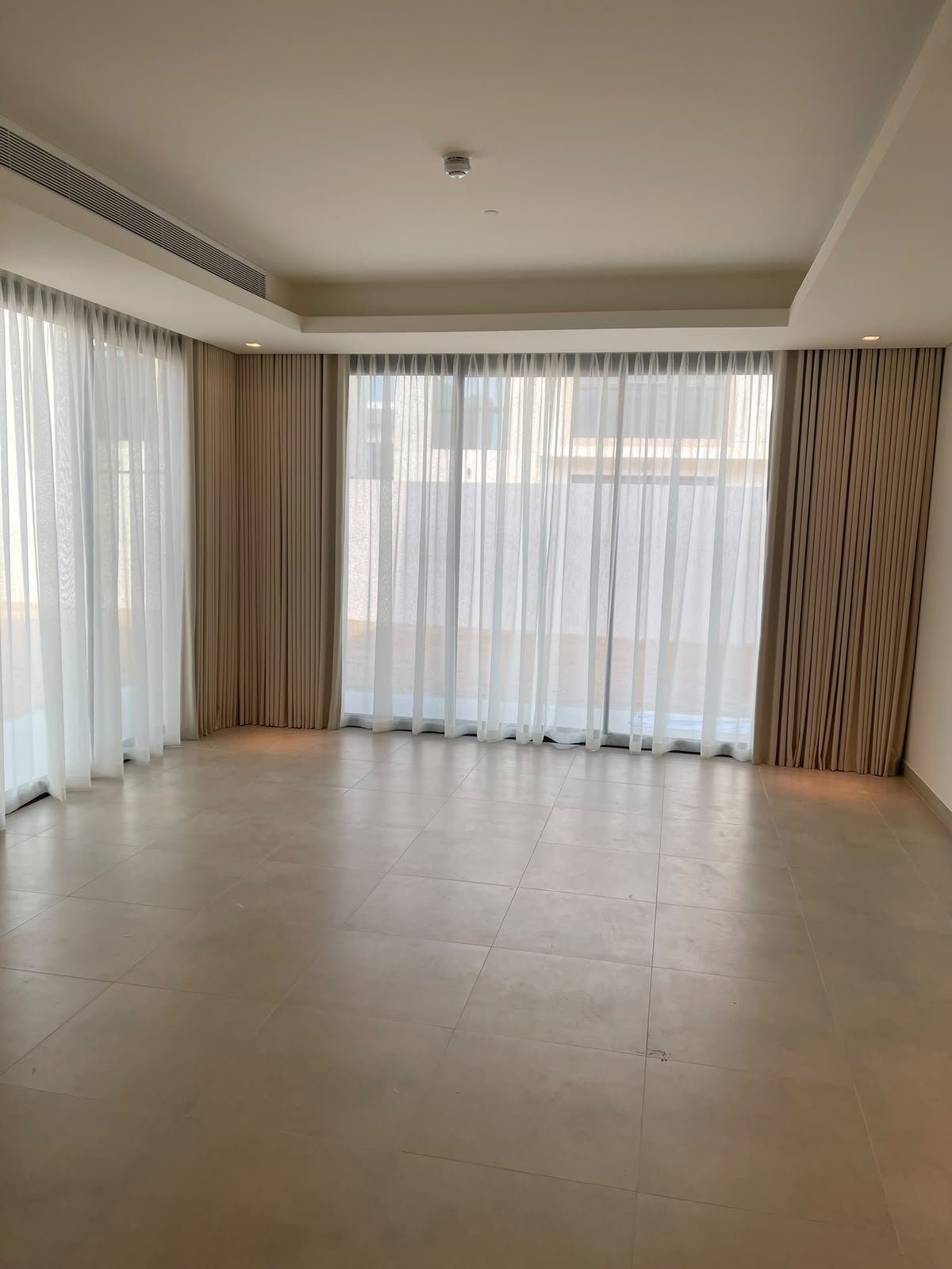 Modern Recessed Wave Curtains with Integrated Cove Lighting